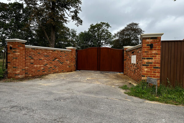 Brick wall with gate